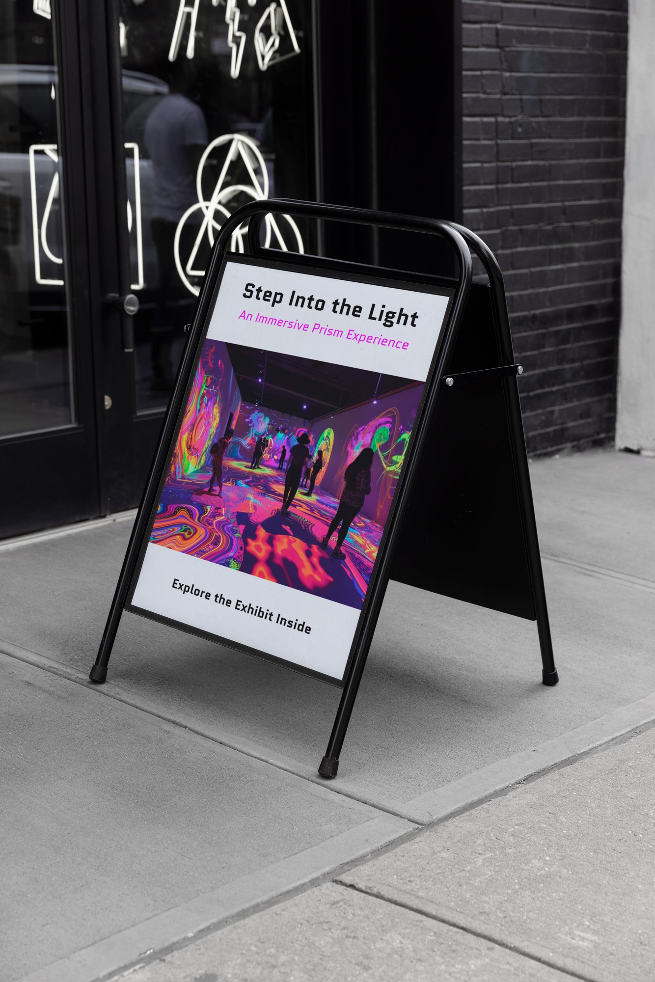 Sidewalk A-frame sign reading Step Into the Light